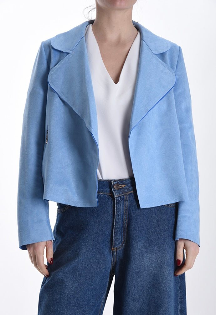 Suede jacket with decorative zip pockets.