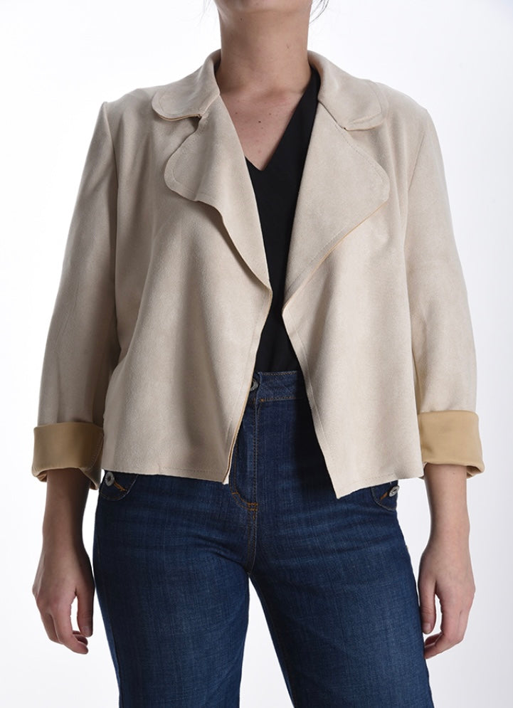 Suede jacket with decorative zip pockets.